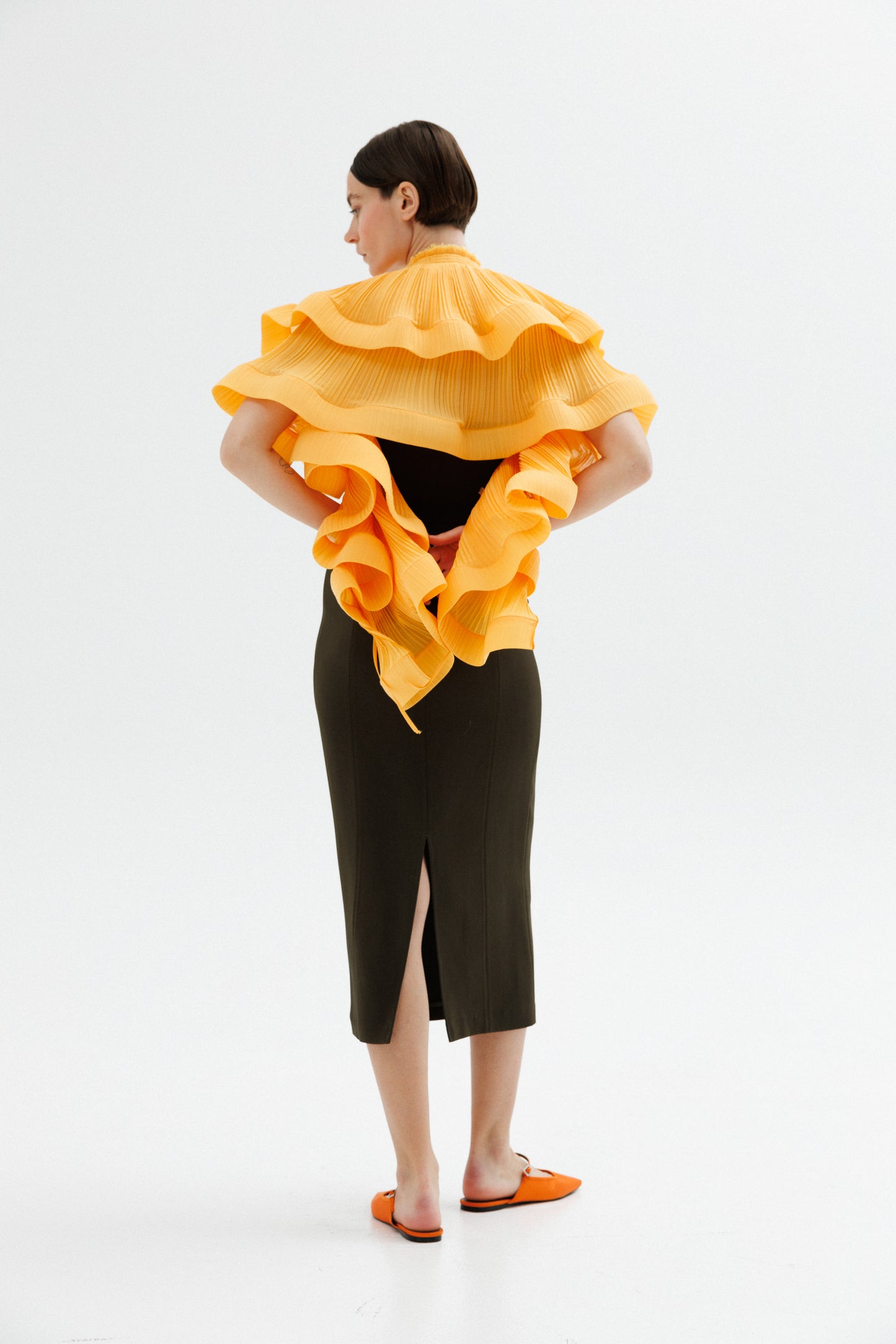 Transformed plisse chiffon top