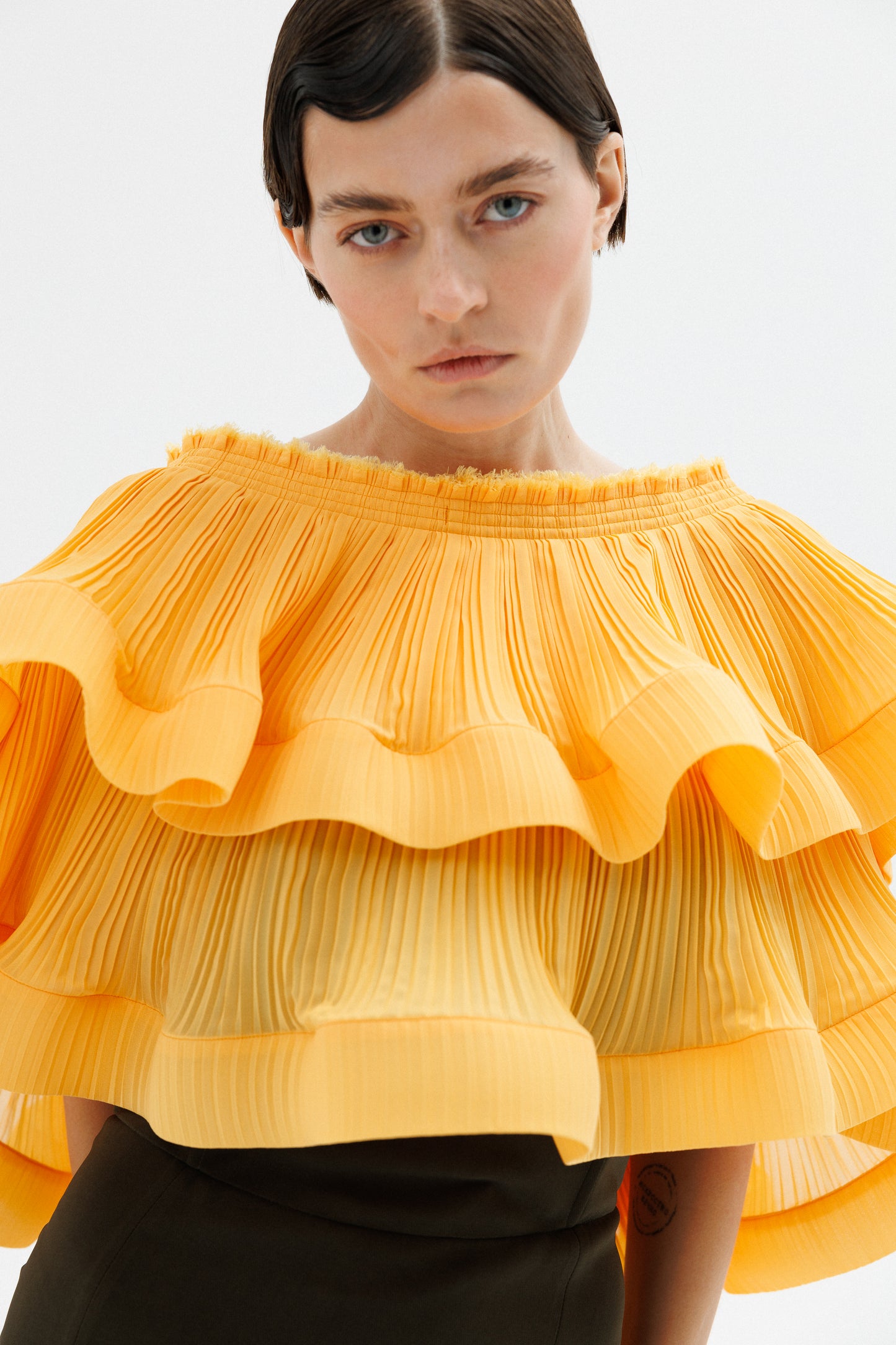 Transformed plisse chiffon top