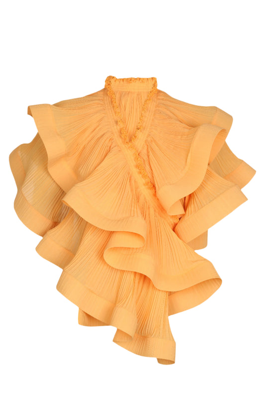 Orange ruffled top on a white background